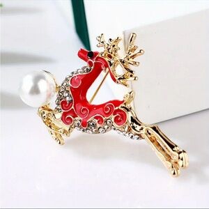 Brooch- reindeer, red enamel paint, NIP, 2” x 1.1”, rhinestones, display case